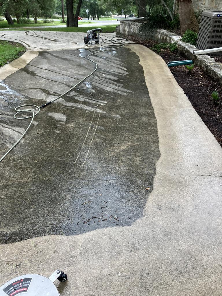 Pressure washing concrete to remove grime and stains in Oklahoma City